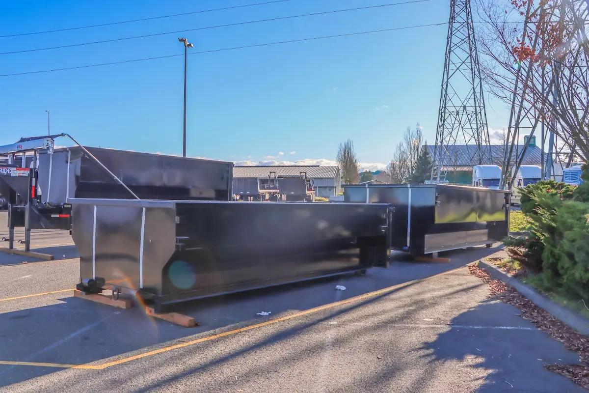 Roll-off dumpster ready for waste disposal at job site for 12 Yard Dumpster Rental in Pensacola